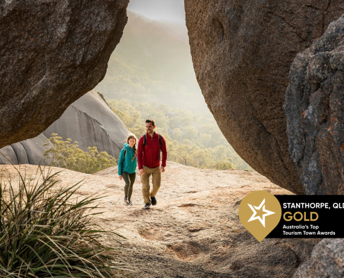 Two people hiking in Girraween National Park.