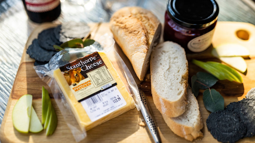 Tray of breads, jams and Stanthorpe Cheese